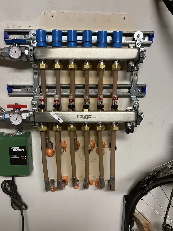 Plumber performing Gas Line Installation at a residential property in Point